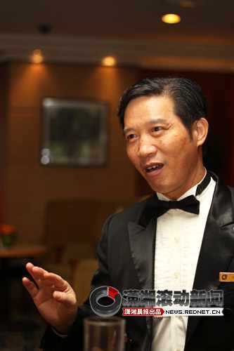 Lu Zhuheng is a famous doorman at the Dolton Hotel in Changsha, capital of Hunan province.  