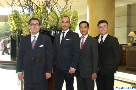 从左至右依次为:Ted Kitahara、Rene Mayer、何自良、戴乐