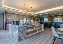 逸柏酒店集团温州绽放，途客中国酒店报喜鸟总部店共鉴旅途品质